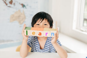 Montessori Preschool Student Loves Learning.